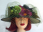 Deauville Olive tweed toyo with antique feather flowers & silk veiling